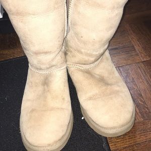 Tall sand colored UGGs